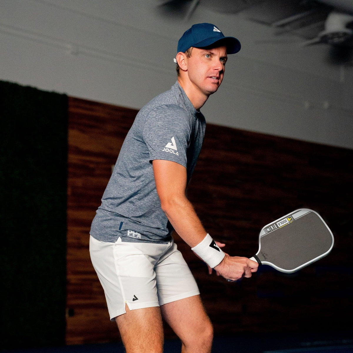 Collin Johns holding the JOOLA Scorpeus Pro IV pickleball paddle